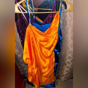 2 thin orange dresses !!